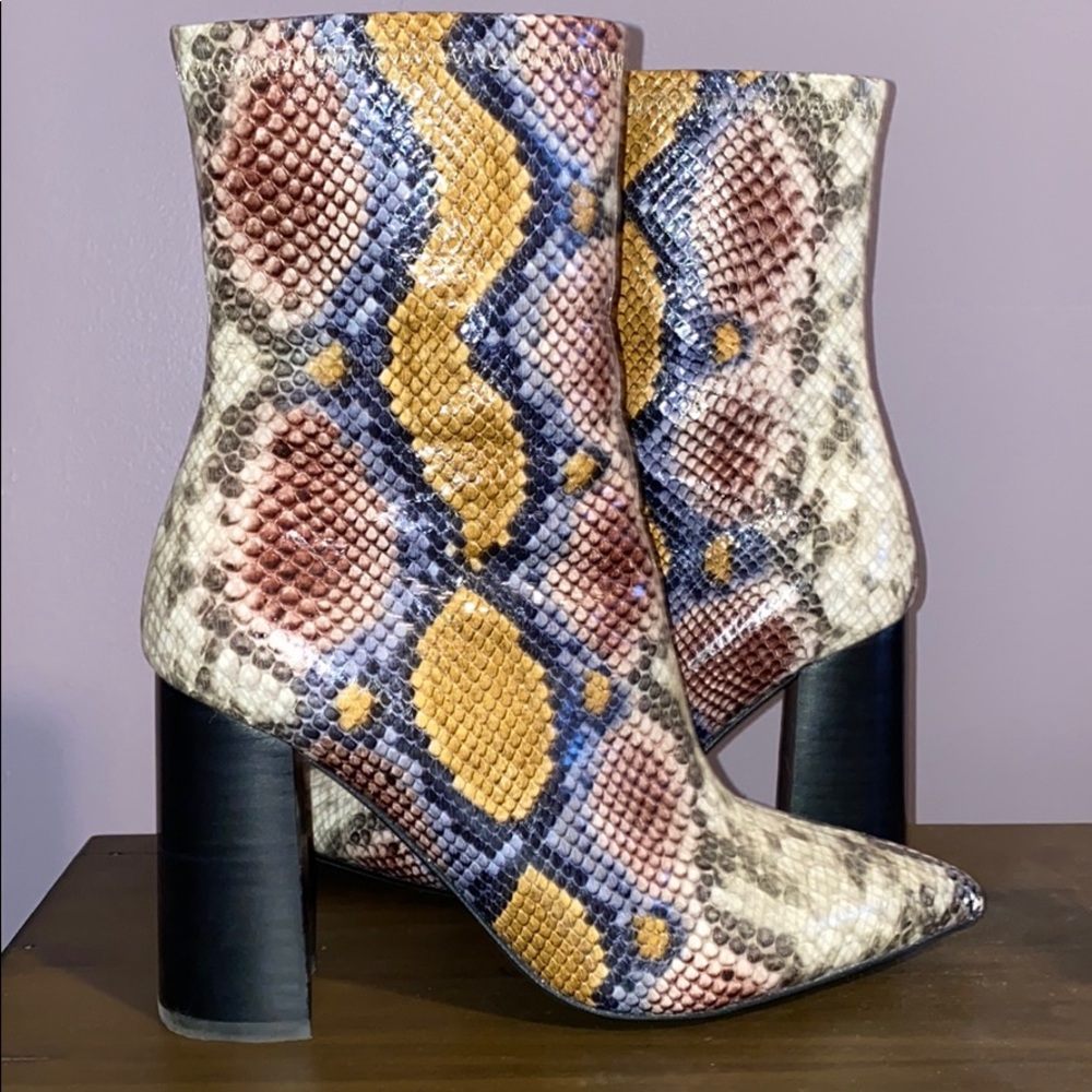 Siren Bootie in Grey Wine Snake
Jeffrey Campbell